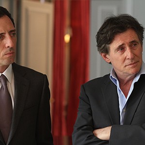 (L-R) Gad Elmaleh as Marc Tourneuil and Gabriel Byrne as Dittmar Rigule in "Capital." photo 11
