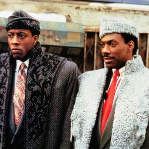 COMING TO AMERICA, from left, Aresnio Hall, Eddie Murphy, 1988, ©Paramount