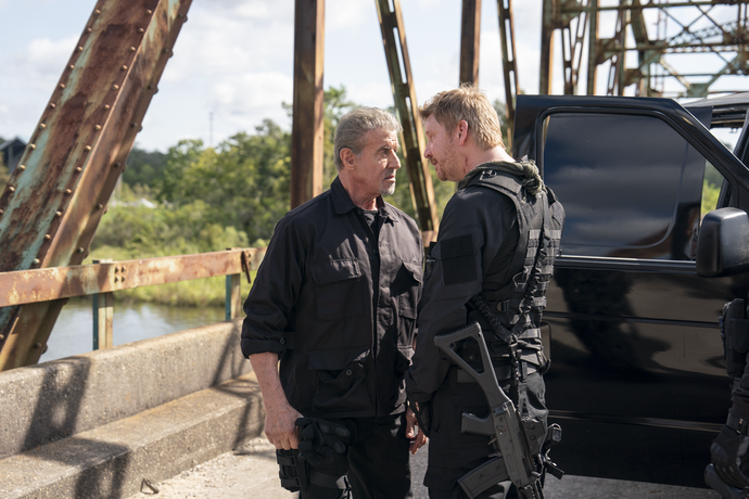 Rook (Sylvester Stallone, L) and Smoke (Dash Mihok) argue, in "Armor." (Lionsgate Films)