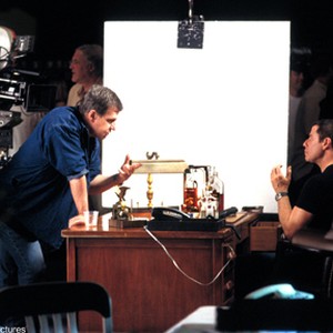 Director John McTiernan, left, discusses an upcoming scene with John Travolta on the set of Columbia Pictures' suspense thriller Basic. photo 11
