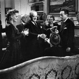 CONFLICT, from left, Charles Drake, Alexis Smith, Grant Mitchell, Sydney Greenstreet, Ann Shoemaker, Humphrey Bogart, 1945