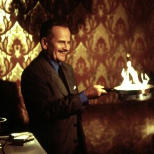 BIG NIGHT, Ian Holm, 1996, happy resatuarant owner serving flambe
