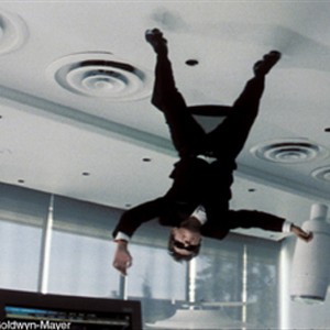 Agent Cody Banks (FRANKIE MUNIZ) avoids detection in a secret lab by walking on the ceiling in MGM Pictures' action-adventure AGENT CODY BANKS.