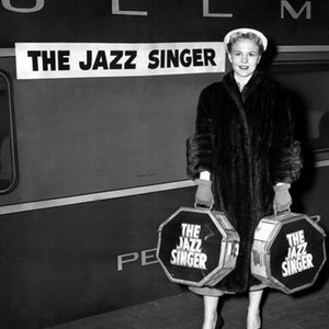THE JAZZ SINGER, Peggy Lee (arriving in NY for the Premiere with the print of the film), 1952