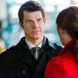 SIGNED, SEALED, DELIVERED: FROM PARIS WITH LOVE, (from left): Eric Mabius, Poppy Montgomery (back to camera), (aired June 6, 2015). photo: Bettina Strauss/©Hallmark Entertainment
