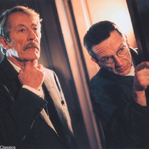 Jean Rochefort (as Manesquier, left) and Director Patrice Leconte (right) on the set of Paramount Classics' award-winning Man on the Train. photo 14