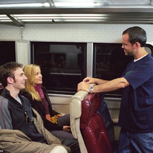 (Left to right)  Chris Evans, Erika Christensen and director Brian Robbins on the set of "The Perfect Score." photo 19