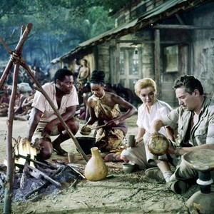 THE SINS OF RACHEL CADE, Errol John (left), Angie Dickinson (second from right), Peter Finch (right), 1961