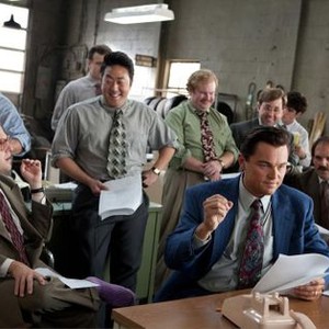 THE WOLF OF WALL STREET, Jonah Hill (left), Kenneth Choi (left of center), Henry Zebrowski (green shirt), Leonardo DiCaprio (front right), P.J. Byrne (right, smiling), Ethan Suplee (right, moustache), 2013. ph: Mary Cybulski/©Paramount Pictures
