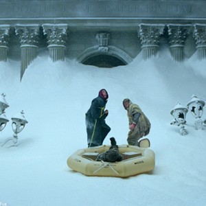 Jake Gyllenhaal (left) and Arjay Smith try and pull a fallen comrade to safety on a frozen New York street. photo 4