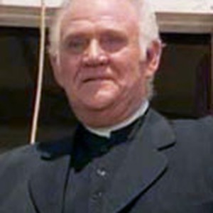 Dabbs Greer as Rev. Robert Alden