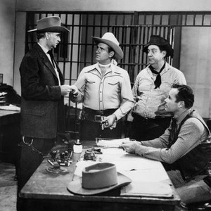 WINNING OF THE WEST, from left: William Forrest, Gene Autry, Smiley Burnette, House Peters Jr, 1952