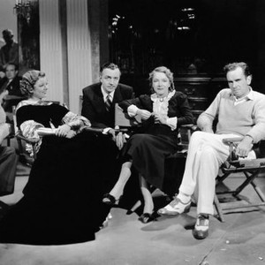 EVELYN PRENTICE, from left: producer John Considine, Myrna Loy, William Powell, visitor Helen Hayes, director William K. Howard on set, 1934