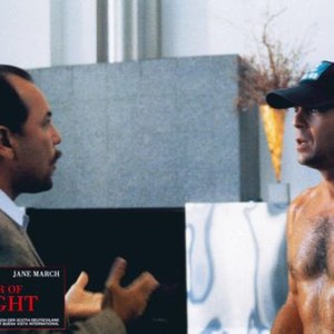 COLOR OF NIGHT, from left: Ruben Blades, Bruce Willis, 1994, © Buena Vista