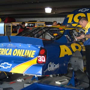 The preparation prior to race day is extensive as the AOL #30 car crew re-builds the car and makes the necessary changes in order to have a shot at victory lane. photo 17