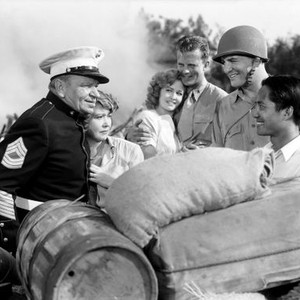 SALUTE TO THE MARINES, from left: Wallace Beery, Fay Bainter, Marilyn Maxwell, William Lundigan, Donald Curtis, Keye Luke, 1943