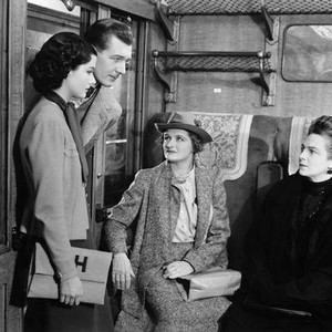 THE LADY VANISHES, Margaret Lockwood (left), Michael Redgrave (in doorway), Mary Clare (right), 1938
