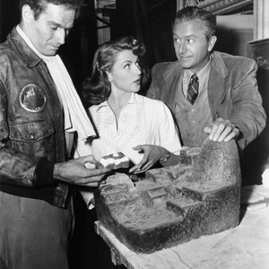 SECRET OF THE INCAS, form left: Charlton Heston, Nicole Maurey, Robert Young, 1954
