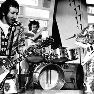 TOMMY, Pete Townshend, Keith Moon, John Entwistle of The Who, performing the song, 'Pinball Wizard,' 1975.