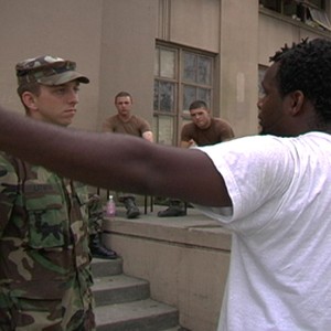 Scott Roberts confronts soldiers in New Orleans in TROUBLE THE WATER, a film by Tia Lessin and Carl Deal. photo 15