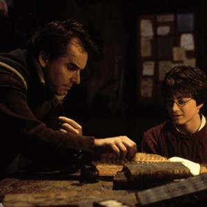 DANIEL RADCLIFFE (right) with CHRIS COLUMBUS (left), director of Warner Bros. Pictures' "Harry Potter and the Chamber of Secrets."