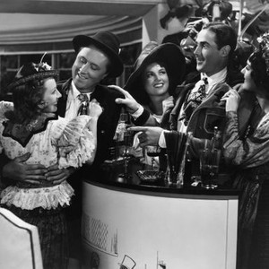 EXPENSIVE HUSBANDS, from left: Beverly Roberts, Allyn Joslyn, Patric Knowles (hand on shoulder), 1937