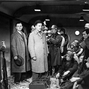 NIGHT TRAIN TO MUNICH, (aka NIGHT TRAIN), in overcoats from left: Naughton Wayne, Basil Radford, 1940, TM & Copyright © 20th Century Fox Film Corp