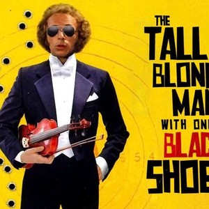 The Tall Blond Man With One Black Shoe photo 10