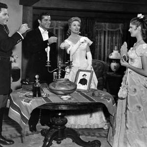 STRANGE LADY IN TOWN, from left: Cameron Mitchell, Dana Andrews, Greer Garson, Lois Smith, 1955