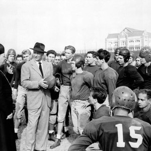 TROUBLE ALONG THE WAY, foregorund from left: Tom Tully, John Wayne (holding football), 1953