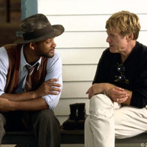 Director ROBERT REDFORD (right) confers with star WILL SMITH on the set. photo 4