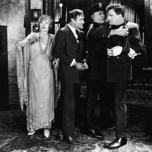 THE MAKING OF O'MALLEY, Dorothy Mackaill(left), Warner Richmond (handcuffed), Milton Sills (being restrained), 1925