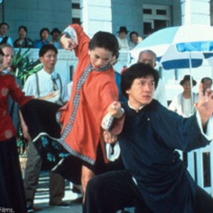 Anita Mui (center left) with Jackie Chan (center). photo 19