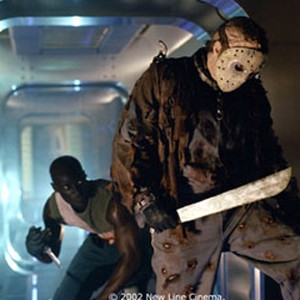 (l to r): Peter Mensah battles Kane Hodder as Jason Voorhees in New Line Cinema's, JASON X.