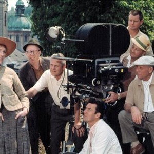 THE SOUND OF MUSIC, Julie Andrews, director Robert Wise (3rd from L), Paul Lockwood (camera operator), Ted. D. McCord (cinematographer), on location in Salzburg, Austria, 1965. TM and Copyright ©20th Century Fox Film Corp. All rights reserved..