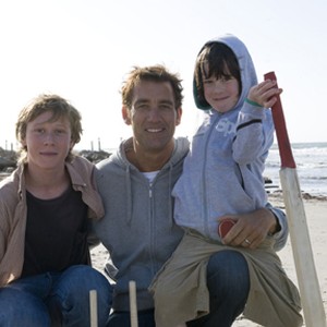 (L-R) George MacKay as Harry, Clive Owen as Joe and Nicholas McAnulty as Artie in "The Boys Are Back."