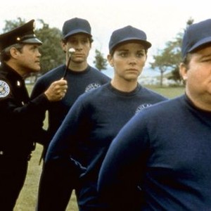 POLICE ACADEMY, G.W. Bailey, Steve Guttenberg, Kim Cattrall, Donovan Scott, 1984, (c) Warner Brothers