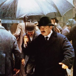 THE SECRET AGENT, Bob Hoskins (front with umbrella), 1996, TM & © 20th Century Fox Film Corp.