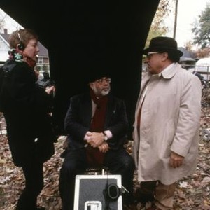 THE RAINMAKER, director Francis Ford Coppola (seated), Danny DeVito on set, 1997, (c) Paramount