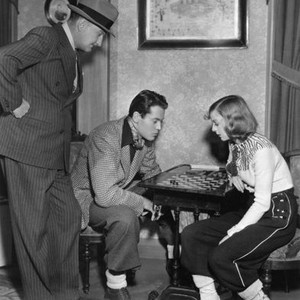 THE MOON'S OUR HOME, director William A. Seiter watches Henry Fonda, Margaret Sullavan playing checkers on set, 1936