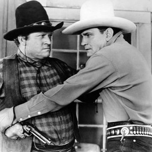 BORDER BRIGANDS, from left: Fred Kohler, Buck Jones, 1935