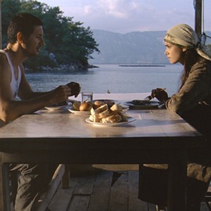 (L-R) Murat Han as Cemal and Özgü Nalam as Meryem in "Bliss." photo 1