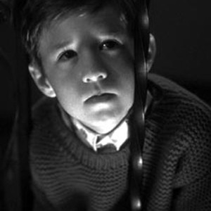 Haley Joel Osment stars as Cole Sear, a boy haunted by a dark secret.