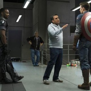 CAPTAIN AMERICA: THE WINTER SOLDIER, from left: Anthony Mackie, director Joe Russo, Chris Evans, 2014. ph: Zade Rosenthal/©Walt Disney Studios Motion Pictures