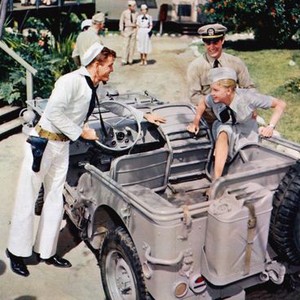 DON'T GO NEAR THE WATER, from left: Earl Holliman, Jeff Richards, Anne Francis (getting into jeep), 1957