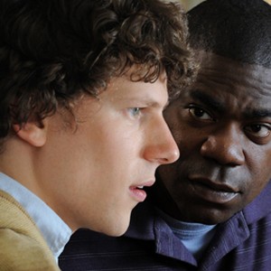 (L-R) Jesse Eisenberg as Eli and Tracy Morgan as Sprinkles in "Why Stop Now?."