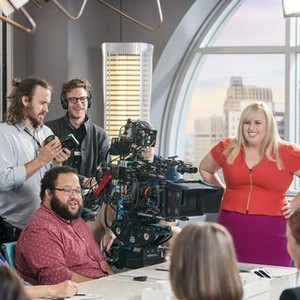 ISN'T IT ROMANTIC, ON-SET, DIRECTOR TODD STRAUSS-SCHULSON (WITH GLASSES AND HEADSET), REBEL WILSON (STANDING, AT RIGHT), 2019. PH: MICHAEL PARMELEE/© WARNER BROTHERS