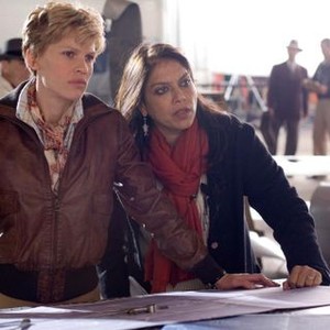AMELIA, from left: Hilary Swank as Amelia Earhart, director Mira Nair, on set, 2009. ph: Ken Woroner/©Fox Searchlight