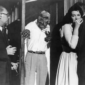 THE HIDEOUS SUN DEMON, Robert Clarke (in doorway), Patricia Manning (second from right), 1959