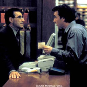 Eugene Levy and John Cusack in a scene from Peter Chelsom's SERENDIPITY. photo 10
